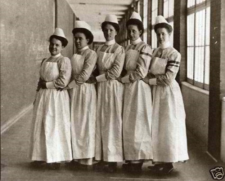 Nurses wearing early Nursing uniforms