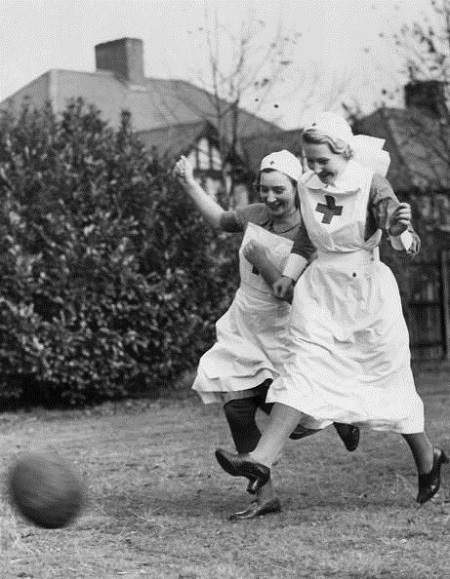 Red Cross nurses playing football, 1939.