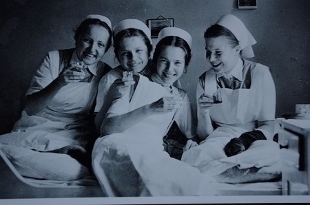 Vintage nurses drinking.