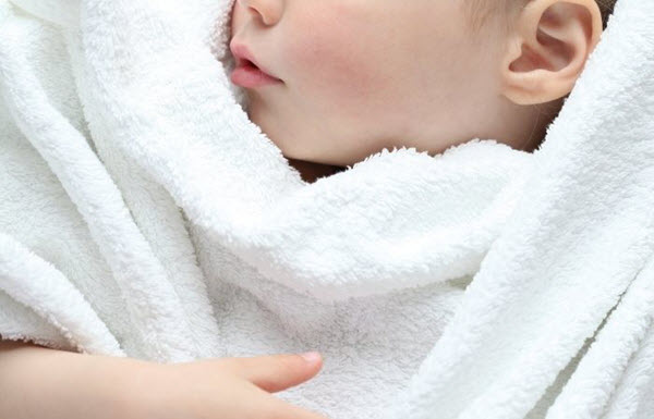wrap pediatric patients in blankets